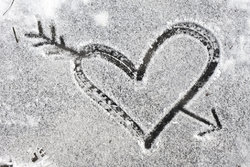 depositphotos_39642449-Heart-pierced-by-an-arrow-drawn-with-the-snow.jpg