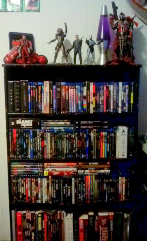 My Blu Rays, TPBs, some assorted books.
Cameos by Kaneda, the Predator, the T-800, RoboCop, and Spawn.
