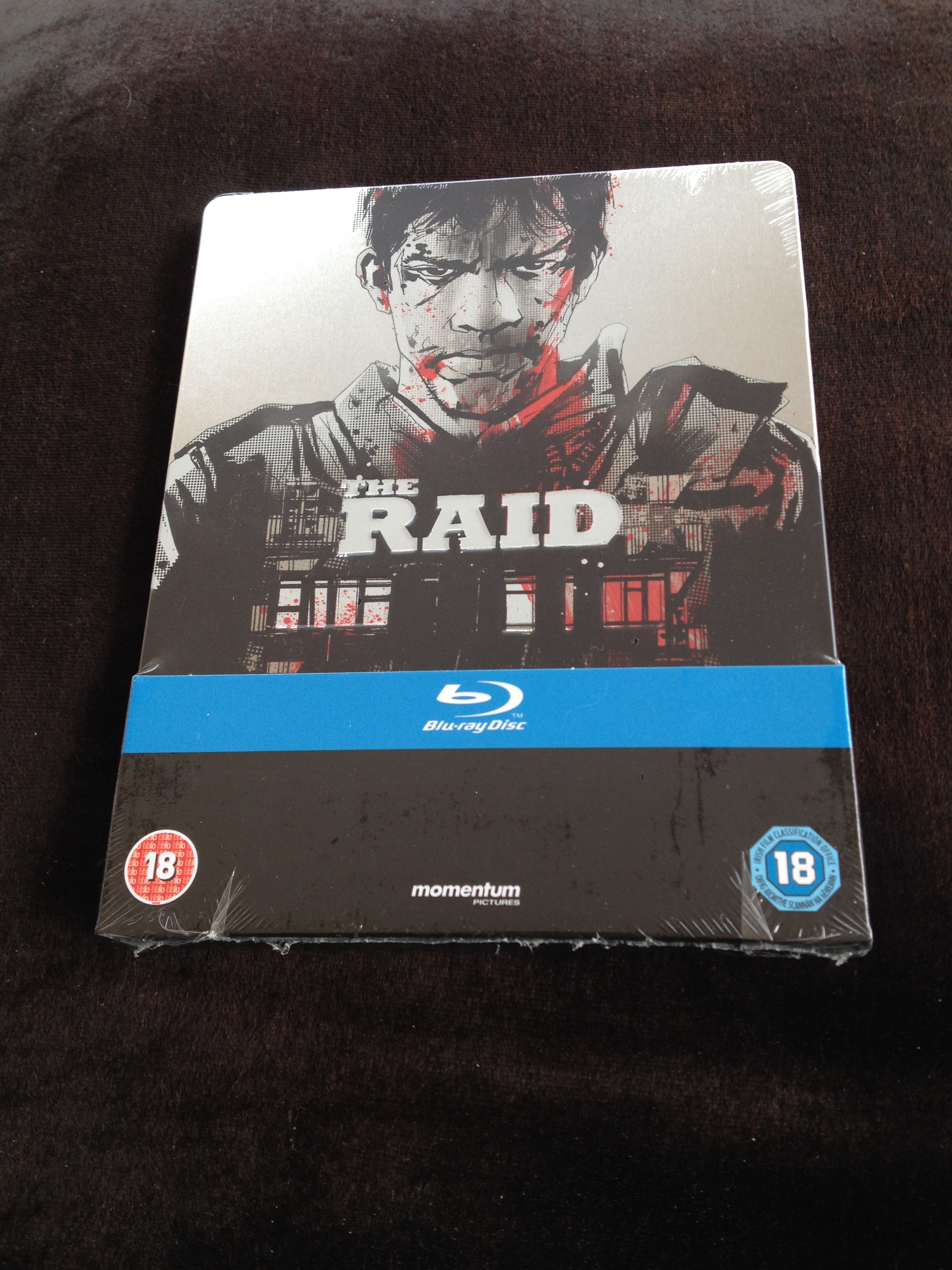 THE RAID (Play.Com, UK)