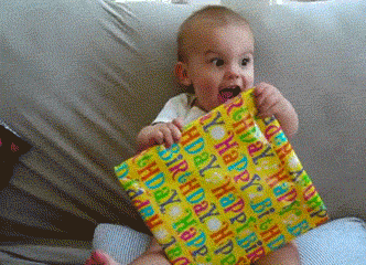 Excited-Baby-Opening-Present.gif